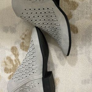 Light grey ankle boots.